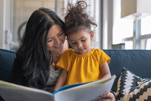 Mother and daughter reading